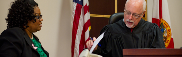 Trial clerk and judge in courtroom